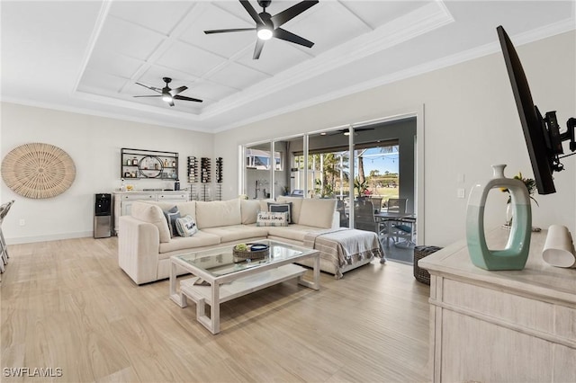 living area featuring crown molding, light wood-style floors, baseboards, and coffered ceiling