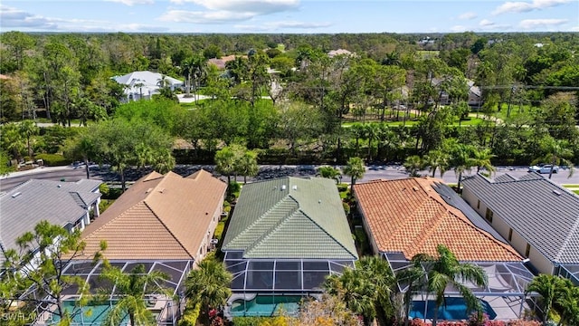 bird's eye view featuring a forest view