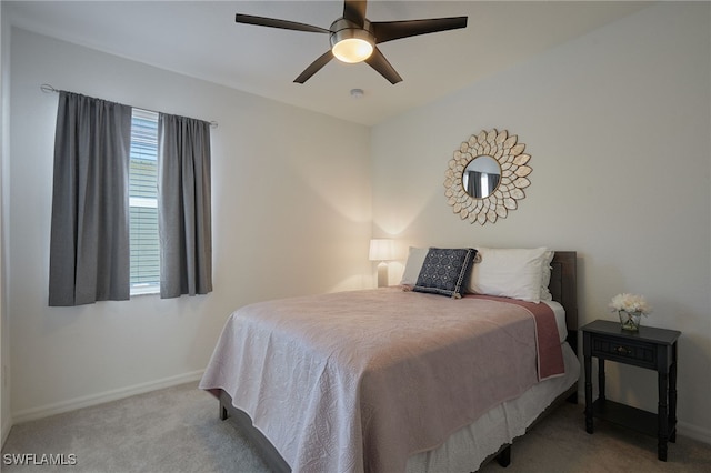 bedroom featuring ceiling fan, carpet floors, and baseboards