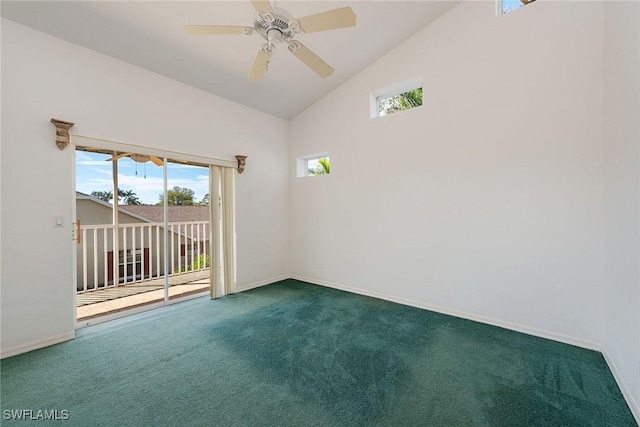 carpeted spare room featuring high vaulted ceiling, ceiling fan, and baseboards