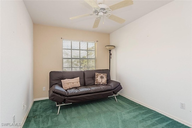 living area with carpet, baseboards, and ceiling fan