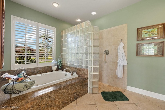 bathroom featuring a garden tub, tile patterned flooring, walk in shower, and recessed lighting