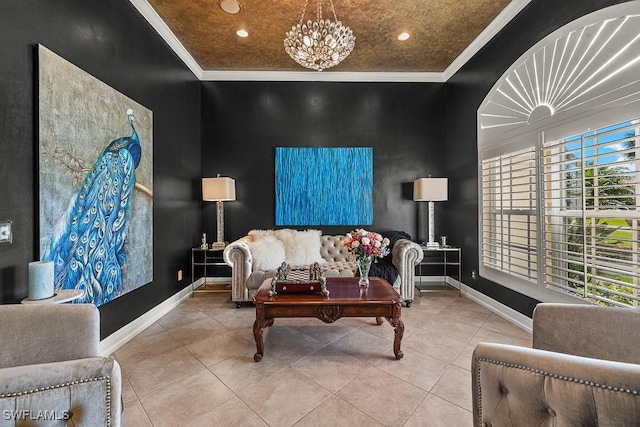 tiled living room featuring crown molding, baseboards, and an inviting chandelier