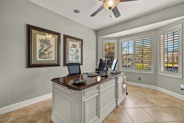 office with light tile patterned floors and baseboards