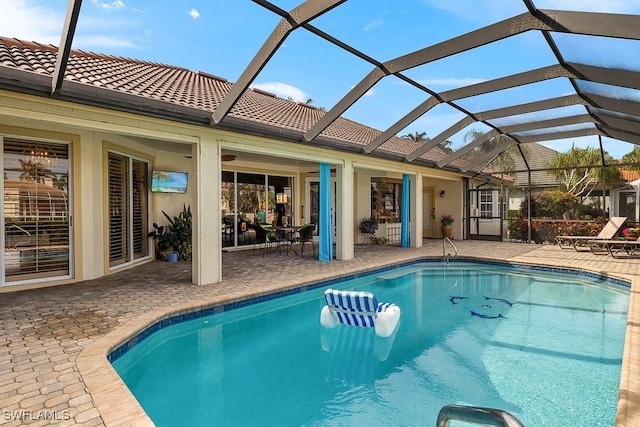 outdoor pool featuring a patio