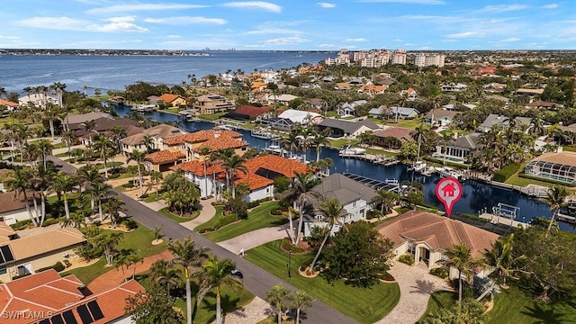 aerial view with a water view and a residential view