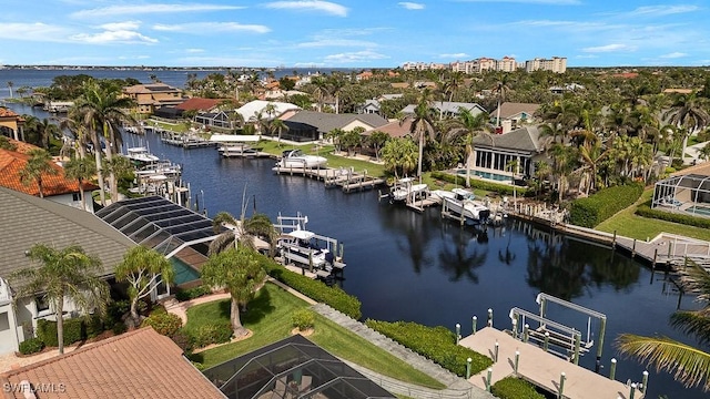 aerial view with a water view and a residential view