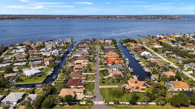 aerial view with a residential view and a water view