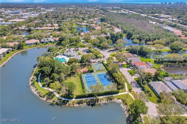 bird's eye view featuring a residential view and a water view