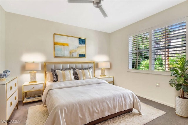 bedroom featuring carpet flooring, a ceiling fan, and baseboards