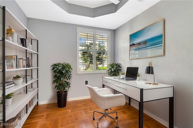 office area featuring baseboards