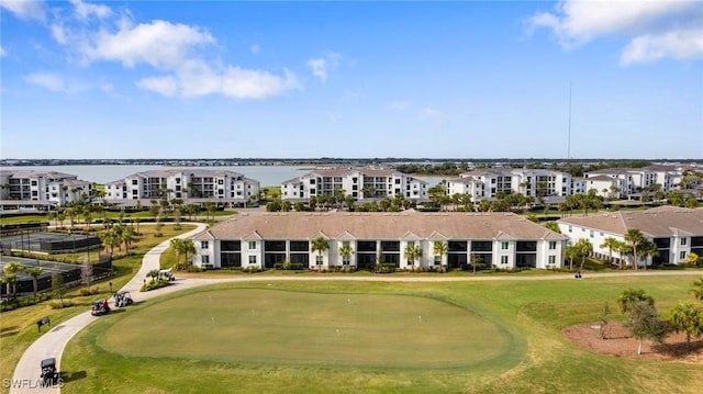 aerial view featuring golf course view and a residential view