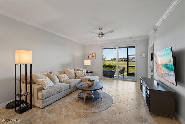 living room featuring baseboards, tile patterned flooring, a ceiling fan, and crown molding