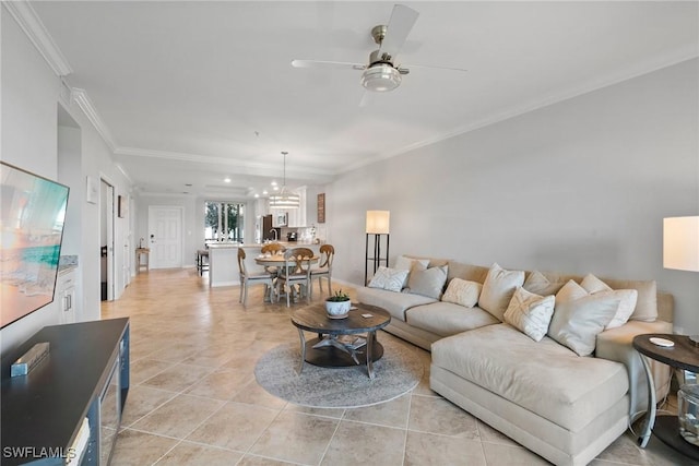 living room featuring ceiling fan, light tile patterned flooring, and crown molding