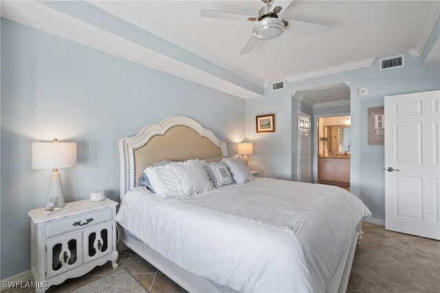 bedroom featuring ceiling fan, visible vents, baseboards, ensuite bath, and crown molding