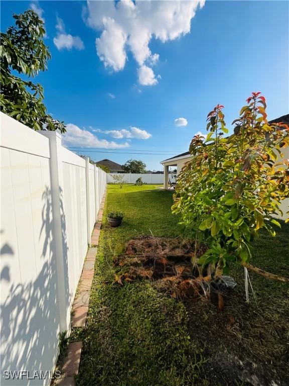 view of yard with fence