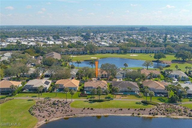 birds eye view of property with a water view and a residential view