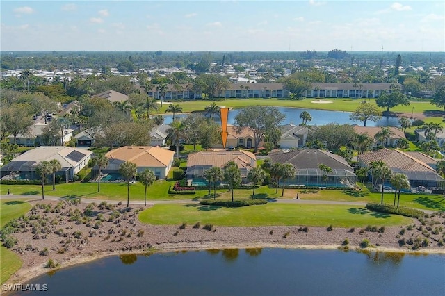 bird's eye view with a water view and a residential view