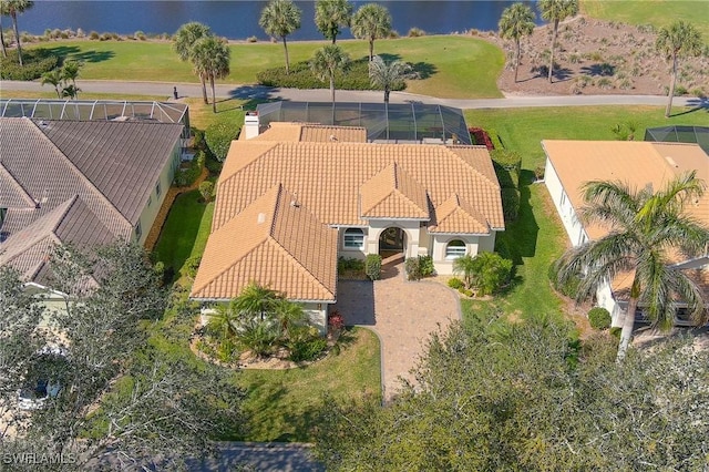 birds eye view of property featuring a water view