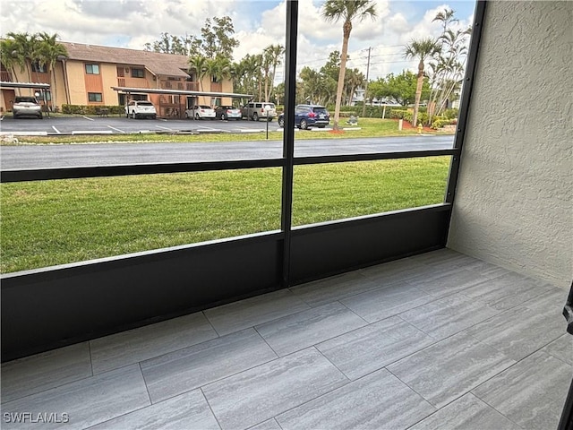 view of unfurnished sunroom