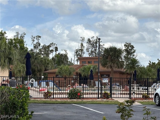 view of gate with fence