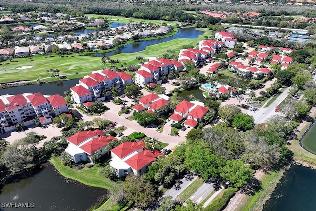 birds eye view of property featuring a residential view, a water view, and golf course view