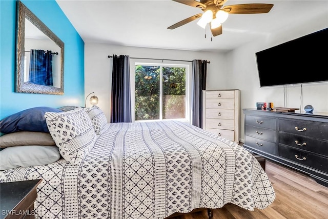 bedroom with a ceiling fan and wood finished floors