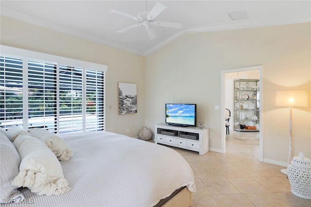 bedroom with light tile patterned floors, lofted ceiling, a ceiling fan, and baseboards