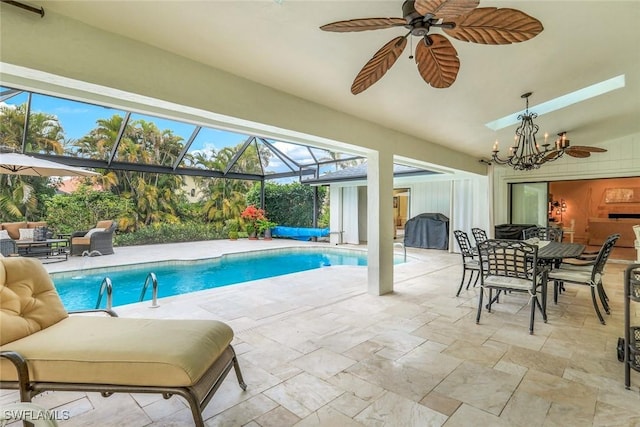 outdoor pool featuring a lanai, ceiling fan, outdoor lounge area, and a patio