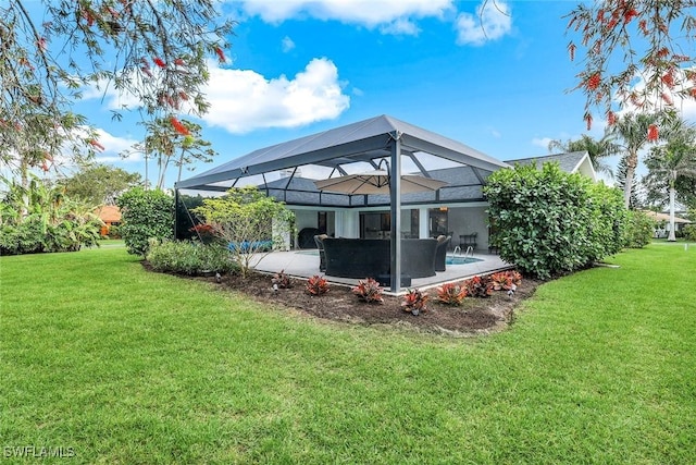 exterior space with a patio area and glass enclosure