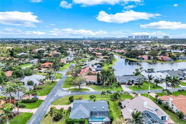 aerial view featuring a water view and a residential view