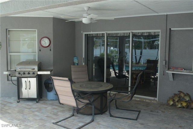 view of patio featuring a ceiling fan