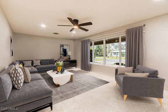 1229 Carlene Ave, Fort Myers, FL 33901 - living room featuring visible vents, baseboards, and ceiling fan