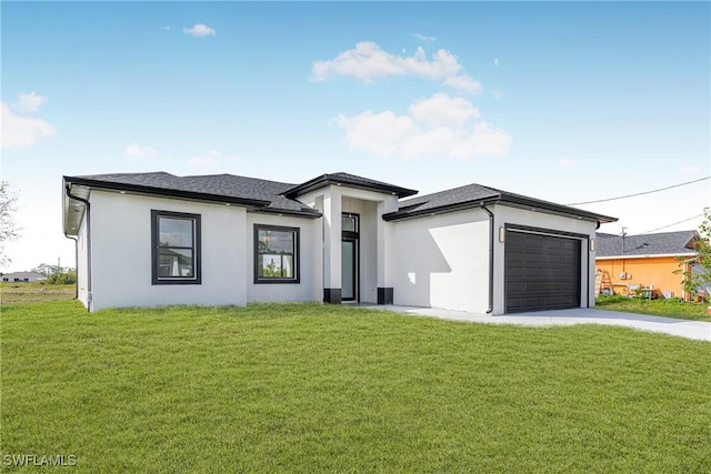 prairie-style home with a front lawn, an attached garage, and stucco siding