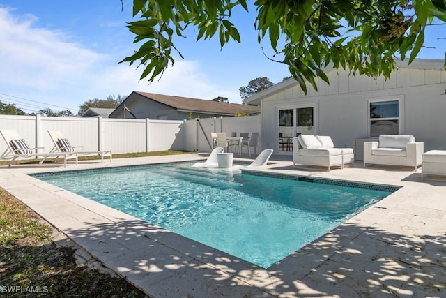 view of swimming pool featuring fence, outdoor lounge area, a fenced in pool, and a patio