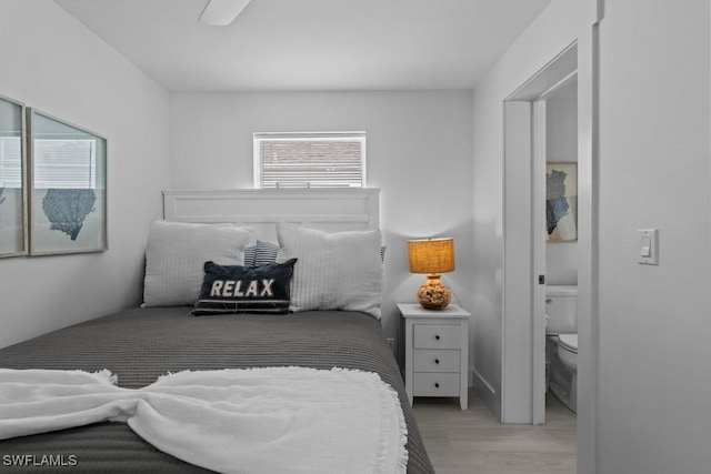 bedroom with light wood finished floors