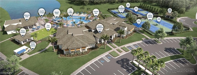 birds eye view of property with a water view