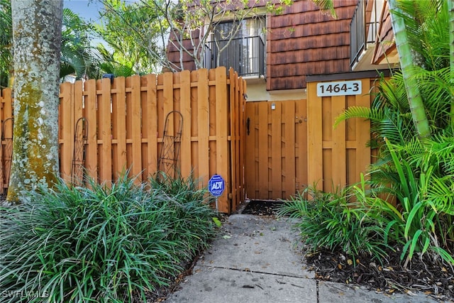 view of gate featuring fence