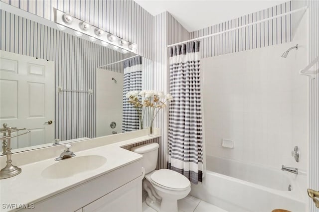 bathroom featuring shower / bathtub combination with curtain, toilet, vanity, tile patterned flooring, and wallpapered walls