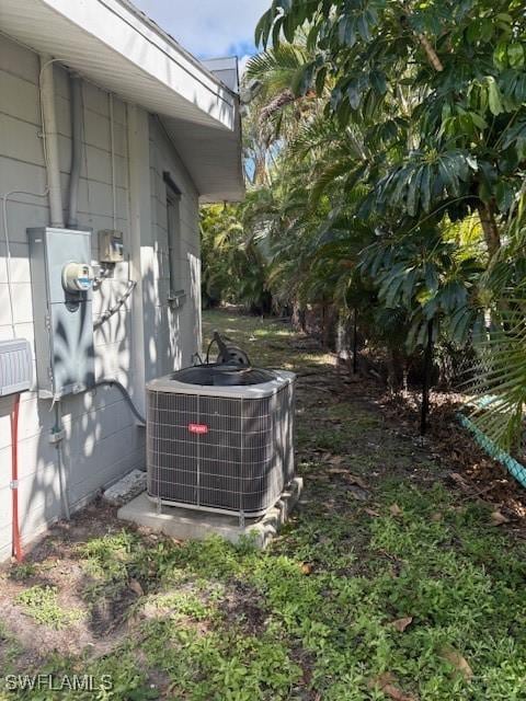 details featuring electric meter and central AC