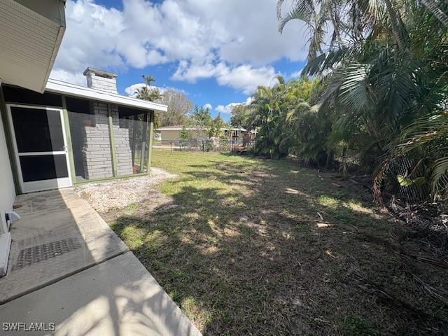 view of yard with fence