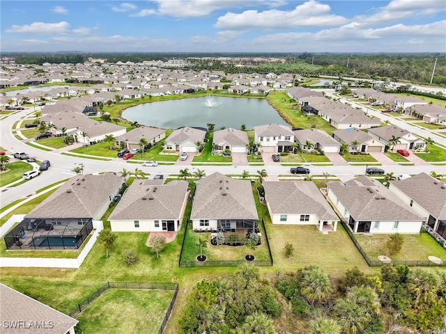 aerial view featuring a water view and a residential view