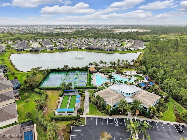 bird's eye view featuring a water view and a residential view