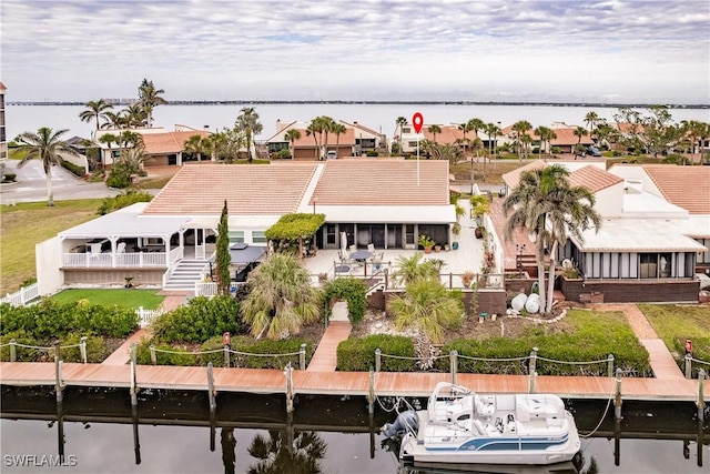 aerial view with a residential view and a water view