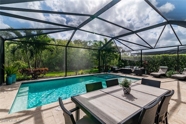 view of swimming pool with a patio, outdoor dining space, outdoor lounge area, and a pool with connected hot tub