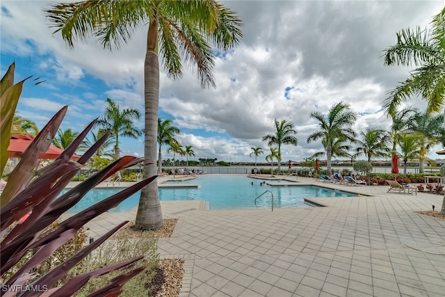 community pool featuring a patio area