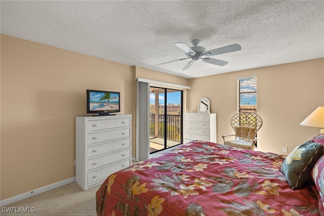 carpeted bedroom featuring a textured ceiling, access to outside, ceiling fan, and baseboards