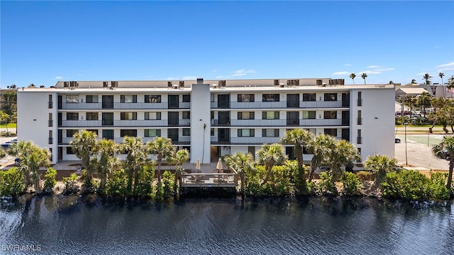 view of building exterior with a water view