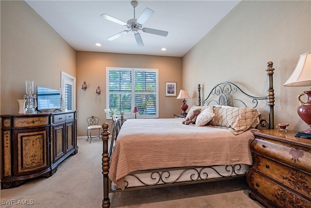 bedroom with recessed lighting, light carpet, and ceiling fan