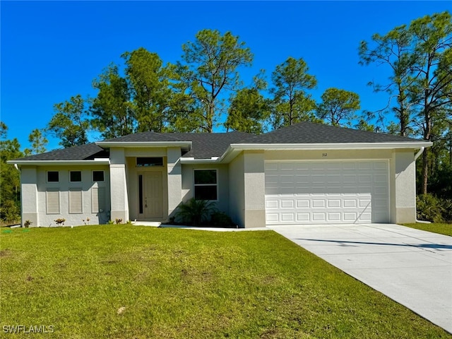 view of front of home featuring a front yard, driveway, an attached garage, a shingled roof, and stucco siding